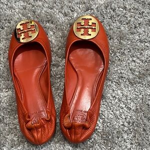 Tory Burch Orange Leather Flats with Gold Emblem